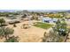Aerial view of property featuring large backyard with mature trees and grass, and other outdoor features at 28213 N Holly Rd, San Tan Valley, AZ 85143