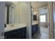 Stylish bathroom with a double sink vanity and modern fixtures; a clean, inviting space at 3841 E Oxford Ln, Gilbert, AZ 85295