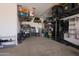 Organized garage interior with shelving, work bench, and storage solutions for efficient space at 3841 E Oxford Ln, Gilbert, AZ 85295