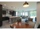 Spacious living space combining kitchen, dining, and living areas for seamless entertaining at 3841 E Oxford Ln, Gilbert, AZ 85295