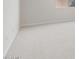 Spacious bedroom with neutral carpet, base molding and neutral paint at 42855 W Palo Abeto Dr, Maricopa, AZ 85138