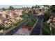 Charming community featuring lush landscaping, palm trees, and well-maintained streets at 4901 S Calle Los Cerros Dr # 206, Tempe, AZ 85282