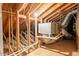 Exposed attic features including insulation, ductwork, and other home systems at 4901 S Calle Los Cerros Dr # 206, Tempe, AZ 85282