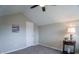 Upstairs bedroom featuring vaulted ceiling at 4901 S Calle Los Cerros Dr # 206, Tempe, AZ 85282