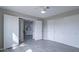 Bedroom boasts neutral walls, wood-look floors, and access to the kitchen and closet at 4901 S Calle Los Cerros Dr # 206, Tempe, AZ 85282