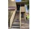 Inviting condo entrance featuring stairs and desert landscaping at 4901 S Calle Los Cerros Dr # 206, Tempe, AZ 85282