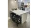Chic kitchenette featuring modern appliances and a sleek white quartz countertop at 4901 S Calle Los Cerros Dr # 206, Tempe, AZ 85282