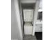 A convenient, stacked washer and dryer located in the bathroom at 4901 S Calle Los Cerros Dr # 206, Tempe, AZ 85282