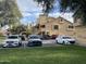 The parking lot provides residents with convenient parking near the well manicured lawns at 4901 S Calle Los Cerros Dr # 206, Tempe, AZ 85282