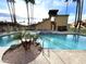 Sparkling pool area with lush landscaping and ample seating for relaxation and recreation at 4901 S Calle Los Cerros Dr # 206, Tempe, AZ 85282