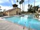 Inviting pool with lounge chairs, a spa, and a tower for a resort-like experience at 4901 S Calle Los Cerros Dr # 206, Tempe, AZ 85282