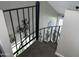Unique spiral staircase with decorative wrought iron railing at 4901 S Calle Los Cerros Dr # 206, Tempe, AZ 85282