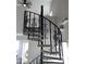 Stylish spiral staircase features decorative ironwork and plush carpeted treads at 4901 S Calle Los Cerros Dr # 206, Tempe, AZ 85282