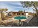 Pool in a well-kept backyard with a fountain at 4925 W Mercer Ln, Glendale, AZ 85304