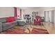 Spacious living room featuring comfortable seating and a modern workspace at 6240 N 16Th St # 37, Phoenix, AZ 85016