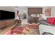 Open-concept living room featuring tile floors, modern furnishings and stylish decor at 6240 N 16Th St # 37, Phoenix, AZ 85016