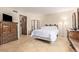 Bright main bedroom with tiled floors, walk-in closet, and ample natural light at 6240 N 16Th St # 37, Phoenix, AZ 85016