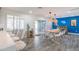 Bright dining room featuring an oversized slider, modern table and chairs at 6802 E Continental E Dr, Scottsdale, AZ 85257