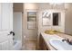 Bathroom with a single sink vanity and a shower and tub combo at 6959 E Red Hawk Cir, Mesa, AZ 85207