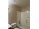 Bathroom features a shower-tub combination with white tile and updated fixtures at 8615 S 45Th Gln, Laveen, AZ 85339