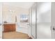 Bright bathroom with a shower, vanity and soaking tub at 8615 S 45Th Gln, Laveen, AZ 85339