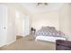 Neutral bedroom with a queen bed and side table offers a serene and inviting space at 8615 S 45Th Gln, Laveen, AZ 85339