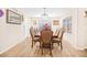 Formal dining room with wood-look tile floors and a chandelier at 8615 S 45Th Gln, Laveen, AZ 85339