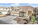Beautiful two-story home with desert landscaping and a three-car garage at 8615 S 45Th Gln, Laveen, AZ 85339