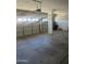 Spacious two-car garage providing ample room for parking and storage at 8615 S 45Th Gln, Laveen, AZ 85339