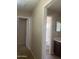 Hallway with doorways leading to the rooms at 8615 S 45Th Gln, Laveen, AZ 85339