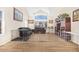 Bright living room with tile floors, high ceilings, plenty of windows, and a pet area at 8615 S 45Th Gln, Laveen, AZ 85339