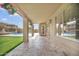 Covered patio offers seamless indoor-outdoor living with a view of the pool at 8615 S 45Th Gln, Laveen, AZ 85339