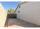 Backyard side view showing concrete and fence at 8749 W Clarendon Ave, Phoenix, AZ 85037