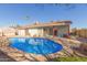 Backyard pool is the perfect place to cool off on a hot summer day with covered patio at 8749 W Clarendon Ave, Phoenix, AZ 85037