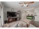 View of the living room leading to the dining area and showcasing stylish decor and finishes at 8749 W Clarendon Ave, Phoenix, AZ 85037