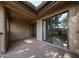 Spacious covered balcony with sliding glass doors, perfect for entertaining and relaxing with a view at 9450 N 94Th Pl # 215, Scottsdale, AZ 85258