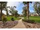 Scenic community with lush greenery, mature trees, and walking paths for an enjoyable outdoor lifestyle at 9450 N 94Th Pl # 215, Scottsdale, AZ 85258