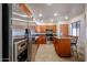 Modern kitchen featuring stainless steel appliances, ample cabinetry, and a functional island for cooking at 9450 N 94Th Pl # 215, Scottsdale, AZ 85258