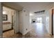 Open space view with an ensuite bathroom, closet and fireplace in the living room at 9450 N 94Th Pl # 215, Scottsdale, AZ 85258