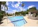 Inviting community pool with comfortable lounge chairs and a beautifully landscaped area at 9450 N 94Th Pl # 215, Scottsdale, AZ 85258