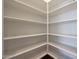 Walk-in pantry with ample shelving at 24437 N 94Th Ave, Peoria, AZ 85383