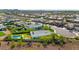 An aerial shot of a community highlights the community's neighborhood layout, with a pool and desert landscaping at 10134 W Cashman Dr, Peoria, AZ 85383