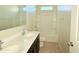 Bright bathroom featuring a double vanity, a shower-tub combo, and a neutral color scheme at 1075 W Avalon Canyon Dr, Casa Grande, AZ 85122