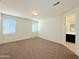 Bedroom featuring a large closet and natural light from two windows at 1075 W Avalon Canyon Dr, Casa Grande, AZ 85122