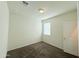 Bedroom featuring carpet flooring and natural light from one window at 1075 W Avalon Canyon Dr, Casa Grande, AZ 85122