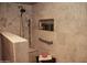 Updated bathroom features a rain shower head, marble-like tile, built-in niche, and a seat at 1119 S Presidio Dr, Gilbert, AZ 85233