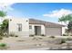 Charming single-story home with desert landscaping and a neutral color palette at 1307 S 185Th Dr, Goodyear, AZ 85338