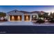 Charming single-story house with a three-car garage, desert landscaping, and a welcoming facade at 13117 W Micheltorena Dr, Sun City West, AZ 85375