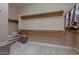 Walk-in closet with shelving and carpeting at 13117 W Micheltorena Dr, Sun City West, AZ 85375