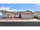 Charming single-story home with desert landscaping and a two-car garage at 1371 E Cactus Bloom Way, Casa Grande, AZ 85122